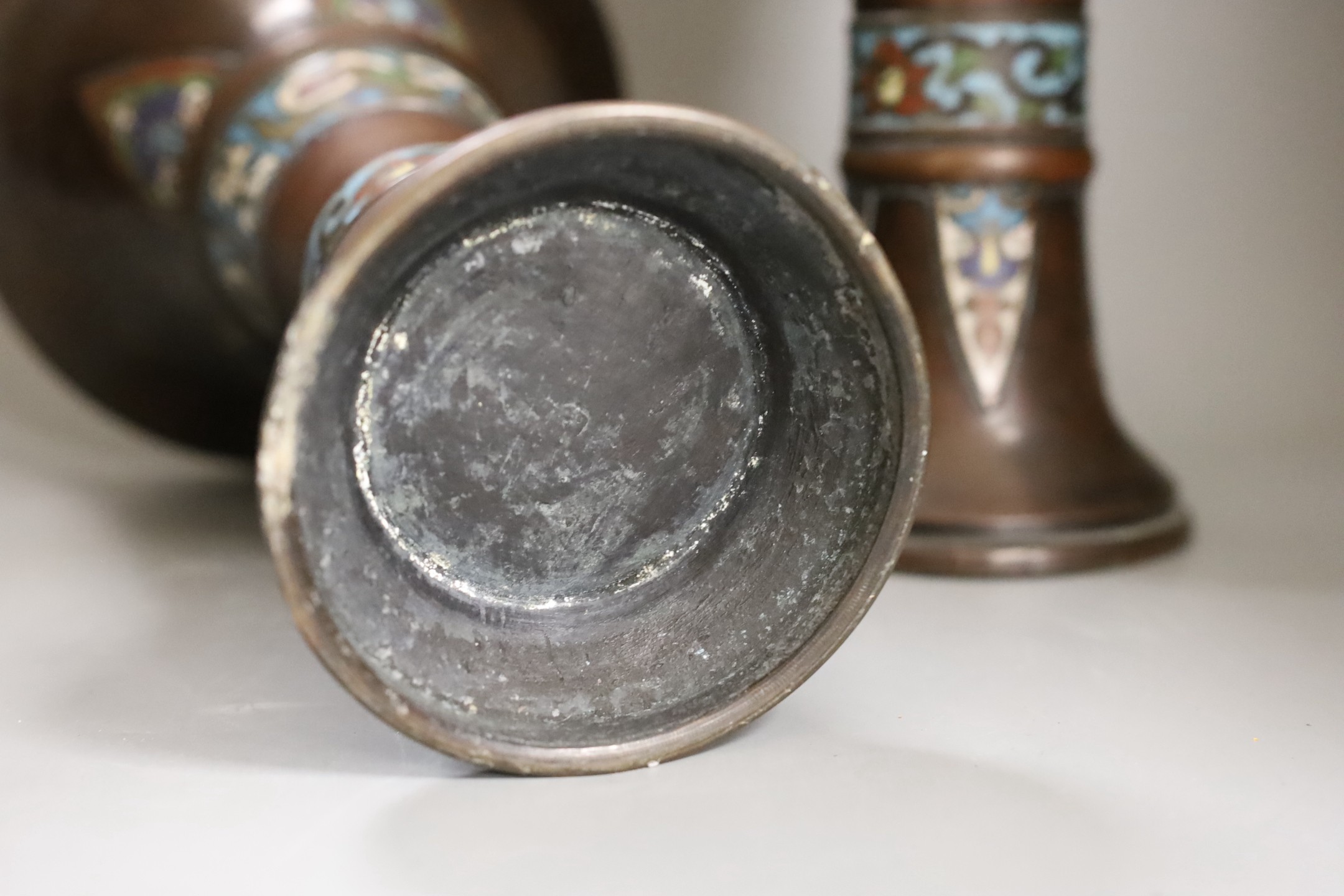 A pair of Japanese bronze and champleve enamel vases, Meiji period, 25.5cm